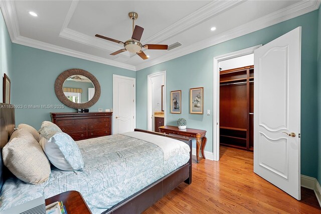 66 S Hibiscus Dr, Miami Beach, FL 33139 - bedroom with light wood-style floors, crown molding, a ceiling fan, and recessed lighting