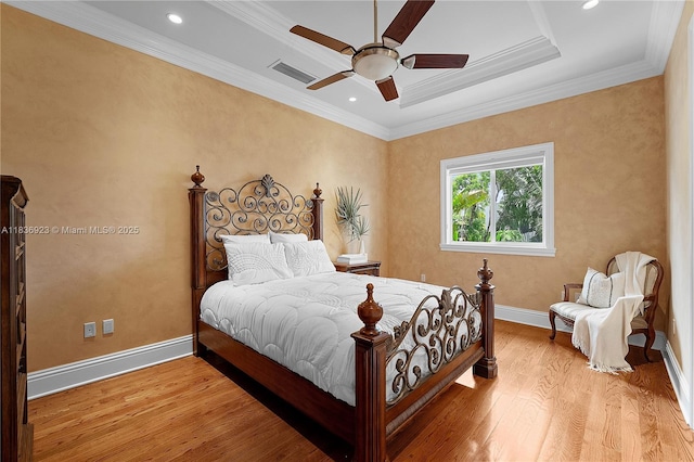 66 S Hibiscus Dr, Miami Beach, FL 33139 - bedroom featuring light wood-type flooring, ornamental molding, recessed lighting, ceiling fan, and ensuite bath
