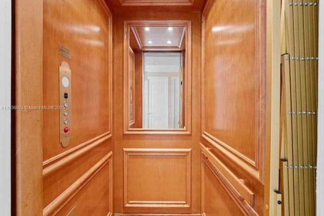 66 S Hibiscus Dr, Miami Beach, FL 33139 - hall with marble tiled flooring, an upstairs landing, crown molding, recessed lighting, and a chandelier