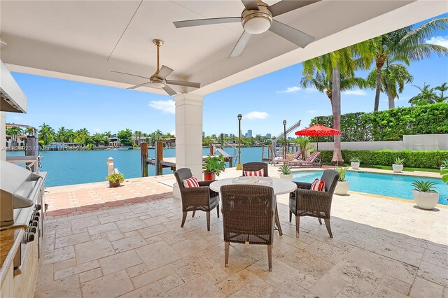 66 S Hibiscus Dr, Miami Beach, FL 33139 - view of patio featuring ceiling fan, a water view, area for grilling, and a dock