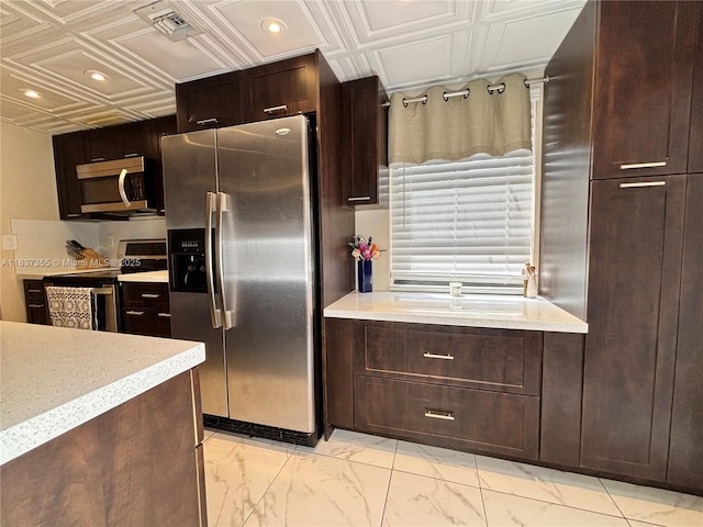 11236 SW 11th St, Pembroke Pines, FL 33025 - kitchen with appliances with stainless steel finishes, an ornate ceiling, light marble finish flooring, light countertops, and recessed lighting