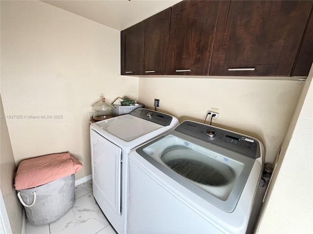 11236 SW 11th St, Pembroke Pines, FL 33025 - laundry area featuring cabinet space, light marble finish floors, and separate washer and dryer