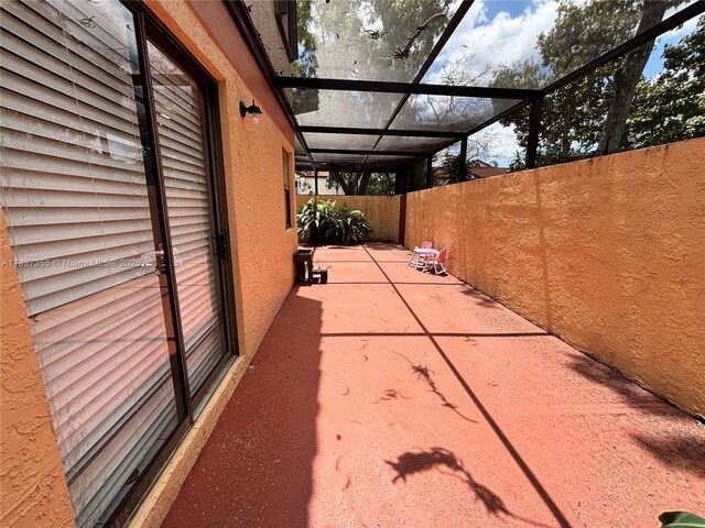 11236 SW 11th St, Pembroke Pines, FL 33025 - view of patio / terrace with a lanai