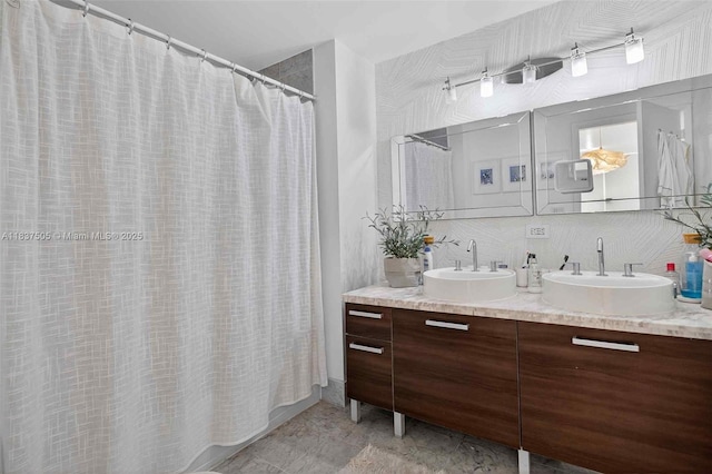 244 Biscayne Blvd Unit 446, Miami, FL 33132 - bathroom featuring double vanity, backsplash, and curtained shower