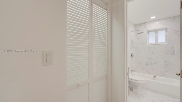 2820 NW 95th St, Miami, FL 33147 - bathroom with marble look tile flooring and shower / bathtub combination