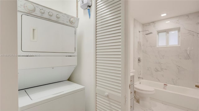 2820 NW 95th St, Miami, FL 33147 - washroom with stacked washing machine and dryer and marble finish floors