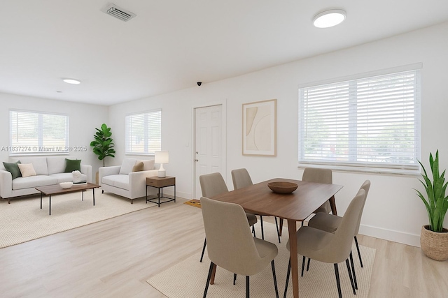 2820 NW 95th St, Miami, FL 33147 - dining area featuring light wood finished floors and baseboards