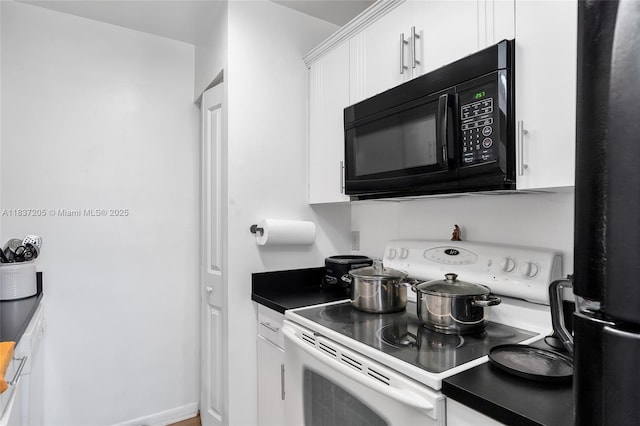 9730 Hammocks Blvd Unit 201-28, Miami, FL 33196 - kitchen with black appliances, white cabinetry, and dark countertops