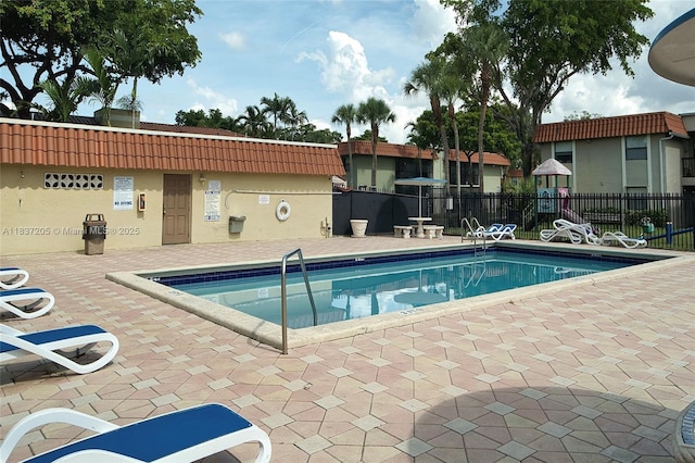 9730 Hammocks Blvd Unit 201-28, Miami, FL 33196 - community pool with a patio