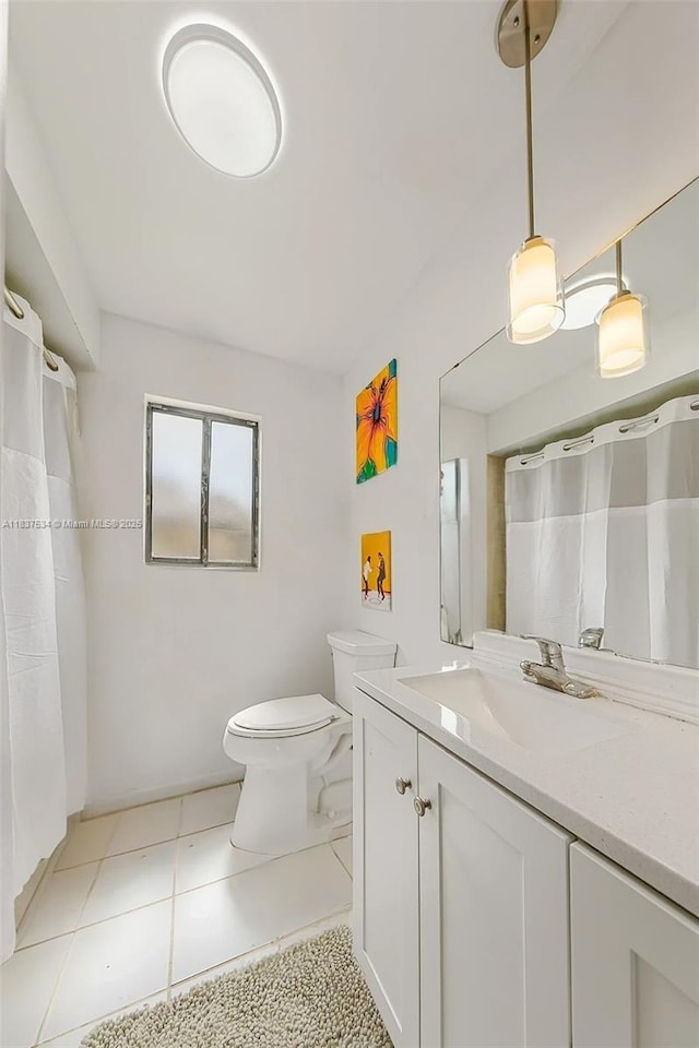 521 NE Dinner, Dinner, Palm Bay, FL 32907 - bathroom with vanity, tile patterned floors, and curtained shower