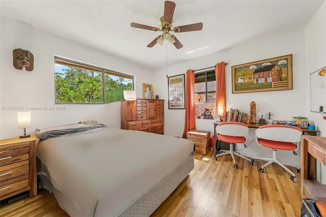 521 NE Dinner, Dinner, Palm Bay, FL 32907 - bedroom featuring light wood-style floors and a ceiling fan
