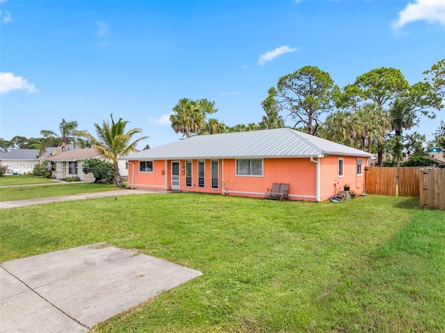 521 NE Dinner, Dinner, Palm Bay, FL 32907 - single story home with a metal roof