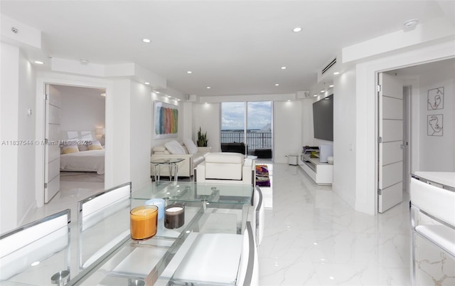 701 Brickell Key Blvd Unit 2011, Miami, FL 33131 - dining area with light marble finish floors and recessed lighting