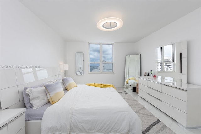 701 Brickell Key Blvd Unit 2011, Miami, FL 33131 - bedroom with light marble finish floors