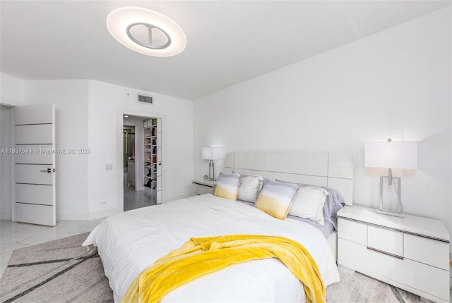 701 Brickell Key Blvd Unit 2011, Miami, FL 33131 - bedroom with marble finish floors and baseboards