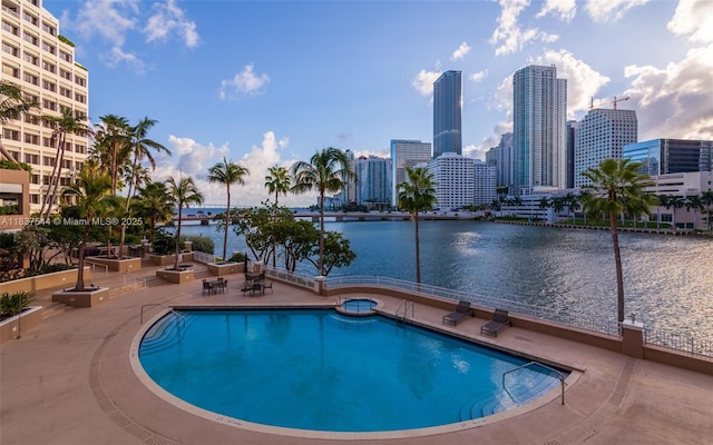 701 Brickell Key Blvd Unit 2011, Miami, FL 33131 - community pool with a skyline view, a water view, and a patio