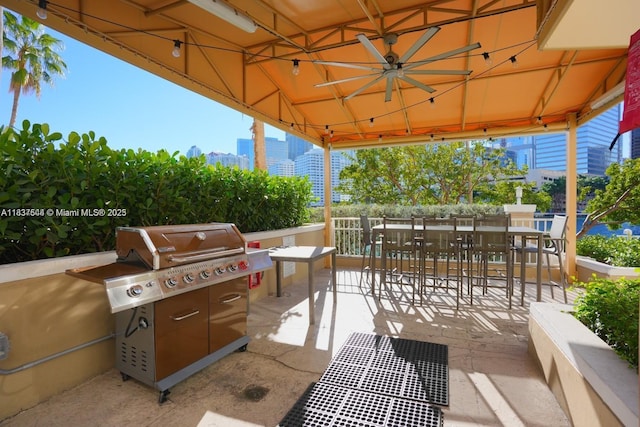 701 Brickell Key Blvd Unit 2011, Miami, FL 33131 - view of patio featuring a gazebo, a grill, and outdoor dining area