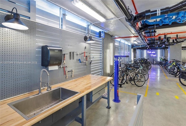 701 Brickell Key Blvd Unit 2011, Miami, FL 33131 - garage featuring a sink and a workshop area
