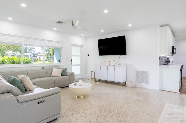 121 SE 7th St, Pompano Beach, FL 33060 - living room featuring ceiling fan, recessed lighting, and speckled floor