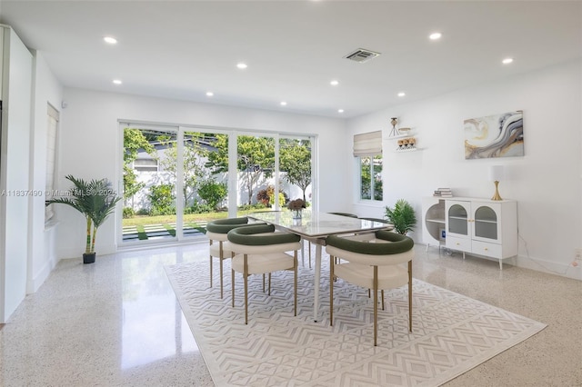 121 SE 7th St, Pompano Beach, FL 33060 - dining space featuring speckled floor and recessed lighting