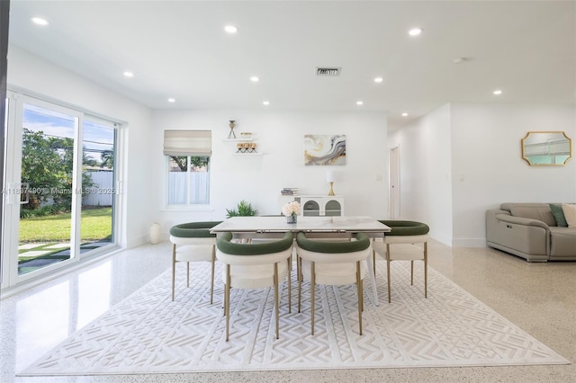 121 SE 7th St, Pompano Beach, FL 33060 - dining room featuring speckle patterned floor and recessed lighting