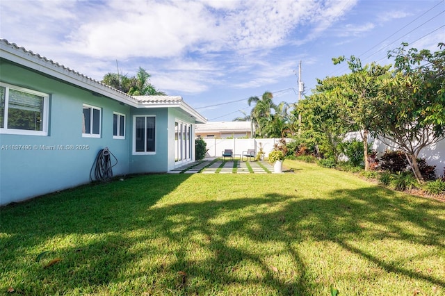 121 SE 7th St, Pompano Beach, FL 33060 - fenced backyard featuring a patio