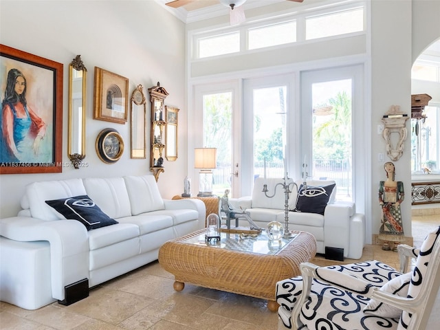 3043 Lakewood Dr, Weston, FL 33332 - living room with a towering ceiling, arched walkways, crown molding, and ceiling fan