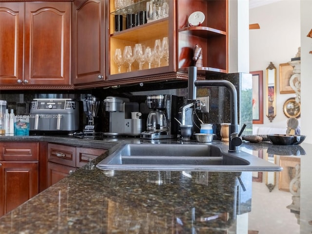 3043 Lakewood Dr, Weston, FL 33332 - kitchen with decorative backsplash, dark stone countertops, and open shelves