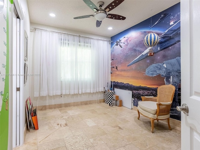 3043 Lakewood Dr, Weston, FL 33332 - living area with ceiling fan, recessed lighting, and stone finish flooring