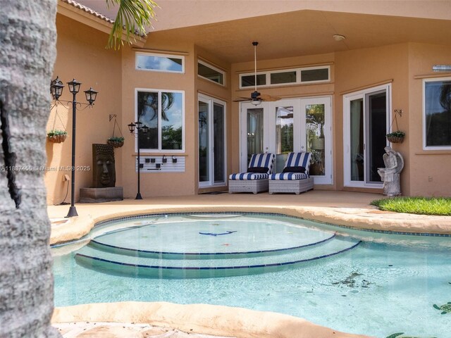 3043 Lakewood Dr, Weston, FL 33332 - swimming pool featuring french doors and a patio