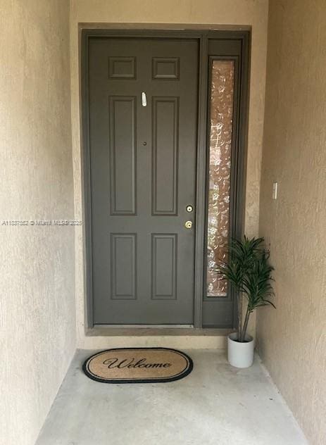 4603 Highgate Dr Unit C, Delray Beach, FL 33445 - property entrance featuring stucco siding