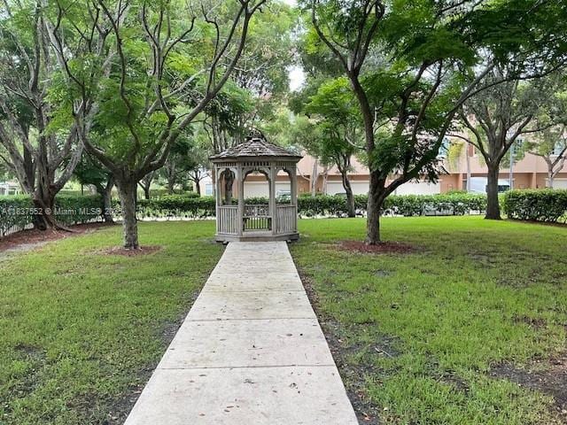 4603 Highgate Dr Unit C, Delray Beach, FL 33445 - view of property's community featuring a gazebo and a yard