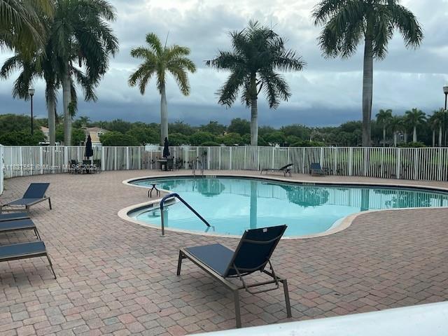 4603 Highgate Dr Unit C, Delray Beach, FL 33445 - community pool with a patio
