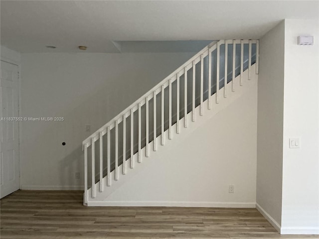 4603 Highgate Dr Unit C, Delray Beach, FL 33445 - stairs featuring wood finished floors and baseboards
