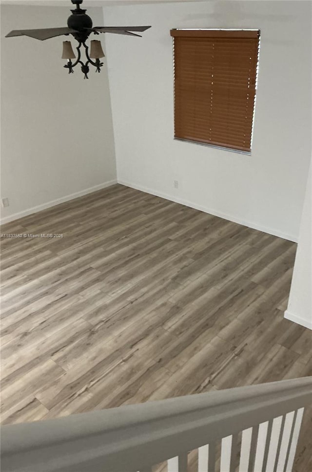 4603 Highgate Dr Unit C, Delray Beach, FL 33445 - unfurnished room with wood finished floors and ceiling fan
