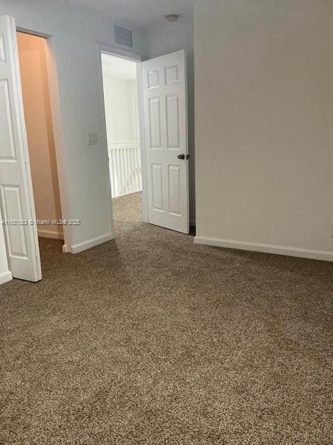 4603 Highgate Dr Unit C, Delray Beach, FL 33445 - carpeted spare room featuring baseboards