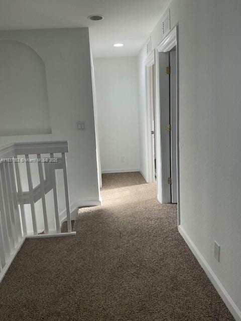 4603 Highgate Dr Unit C, Delray Beach, FL 33445 - corridor featuring carpet floors and baseboards