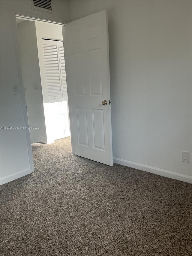 4603 Highgate Dr Unit C, Delray Beach, FL 33445 - unfurnished room featuring carpet flooring and baseboards