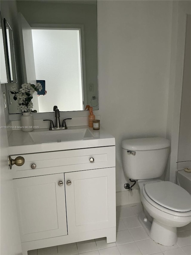 4603 Highgate Dr Unit C, Delray Beach, FL 33445 - half bath featuring tile patterned floors and vanity