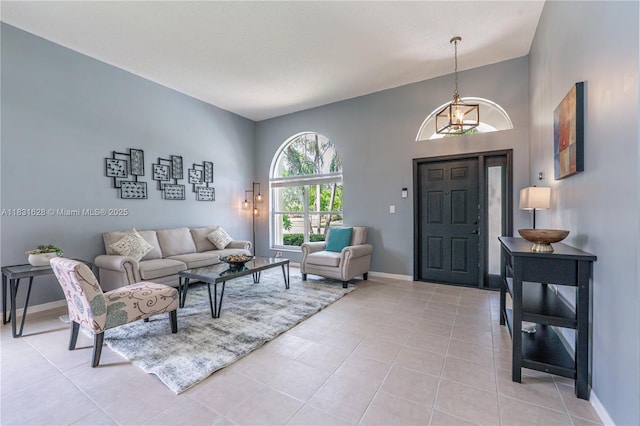 1122 NW 143rd Ave, Pembroke Pines, FL 33028 - living area featuring light tile patterned flooring and baseboards