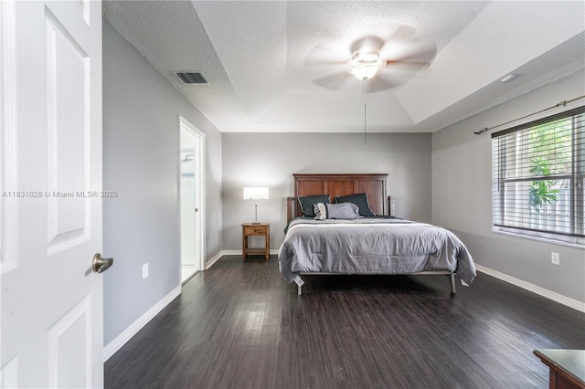 1122 NW 143rd Ave, Pembroke Pines, FL 33028 - bedroom with a textured ceiling, wood finished floors, and a ceiling fan