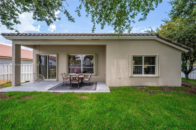 1122 NW 143rd Ave, Pembroke Pines, FL 33028 - rear view of property featuring stucco siding, a patio area, and a tiled roof
