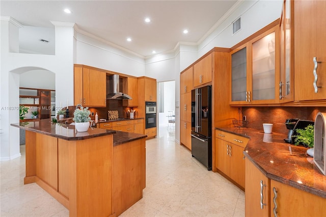 1907 NW 137th Ter, Pembroke Pines, FL 33028 - kitchen with black appliances, wall chimney range hood, arched walkways, a peninsula, and crown molding
