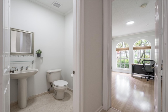 1907 NW 137th Ter, Pembroke Pines, FL 33028 - half bath featuring crown molding and toilet