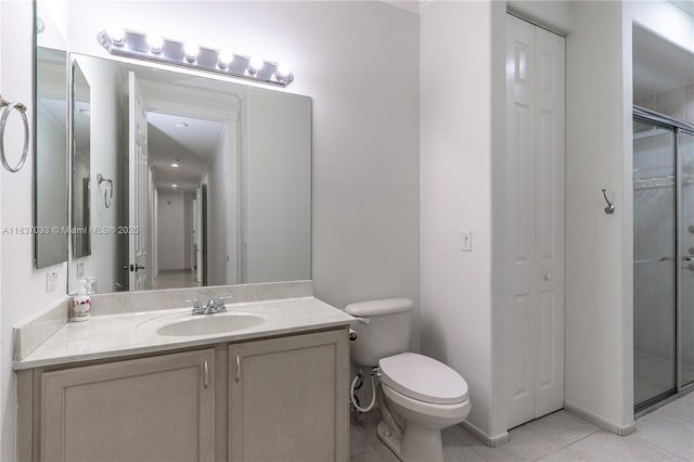 1907 NW 137th Ter, Pembroke Pines, FL 33028 - bathroom featuring a closet, a stall shower, vanity, and tile patterned flooring