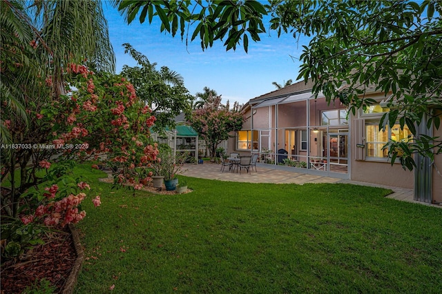 1907 NW 137th Ter, Pembroke Pines, FL 33028 - view of grassy yard featuring a patio area