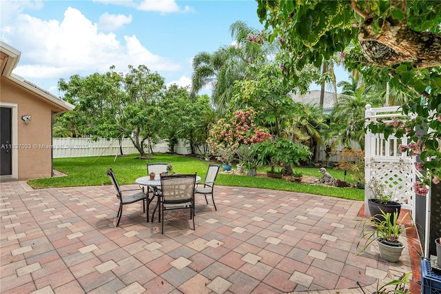1907 NW 137th Ter, Pembroke Pines, FL 33028 - fenced backyard featuring a patio and outdoor dining space
