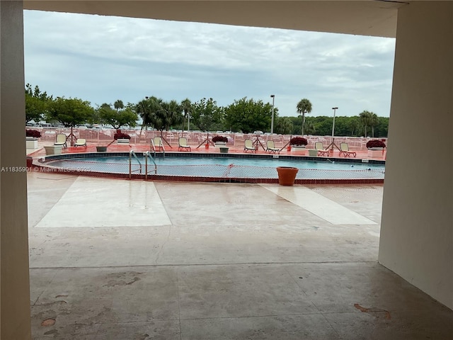 400 Kings Point Dr Unit 623, Sunny Isles Beach, FL 33160 - community pool featuring a patio area