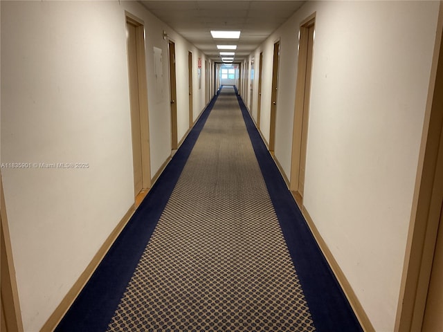 400 Kings Point Dr Unit 623, Sunny Isles Beach, FL 33160 - corridor featuring baseboards