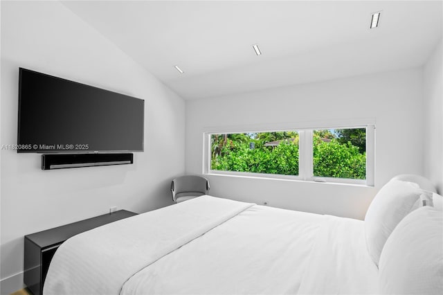 9033 Emerson Ave, Surfside, FL 33154 - bedroom with vaulted ceiling